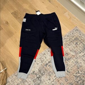 Puma Kids Joggers in Navy with Red and Gray Details